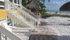 Stairs of beachside rooms leading to the beach